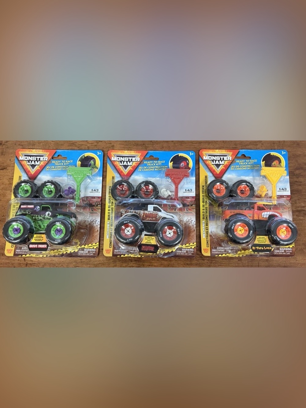 3 Monster Jam Ready To Race Kit 1/43 Scale. Grave Digger, Zombie, El Toro Loco